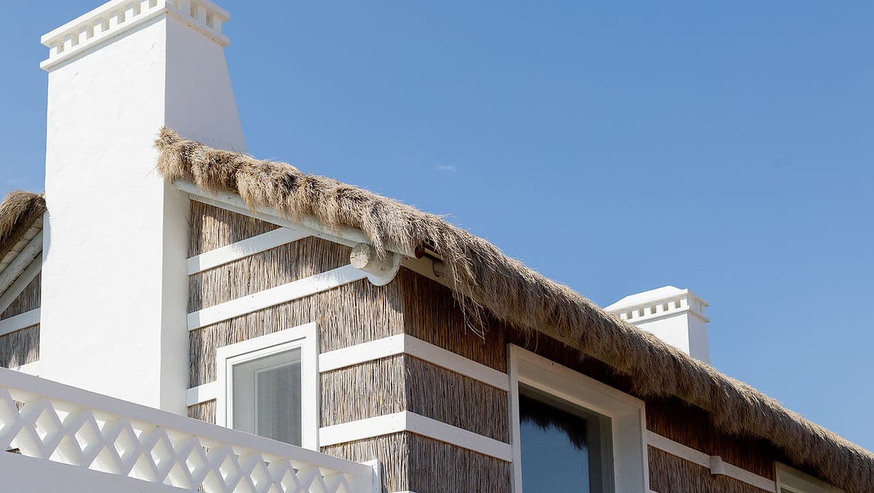 Thatched roof detail and chimneys on Rafter Comporta Celeste holiday rental in Comporta, Portugal