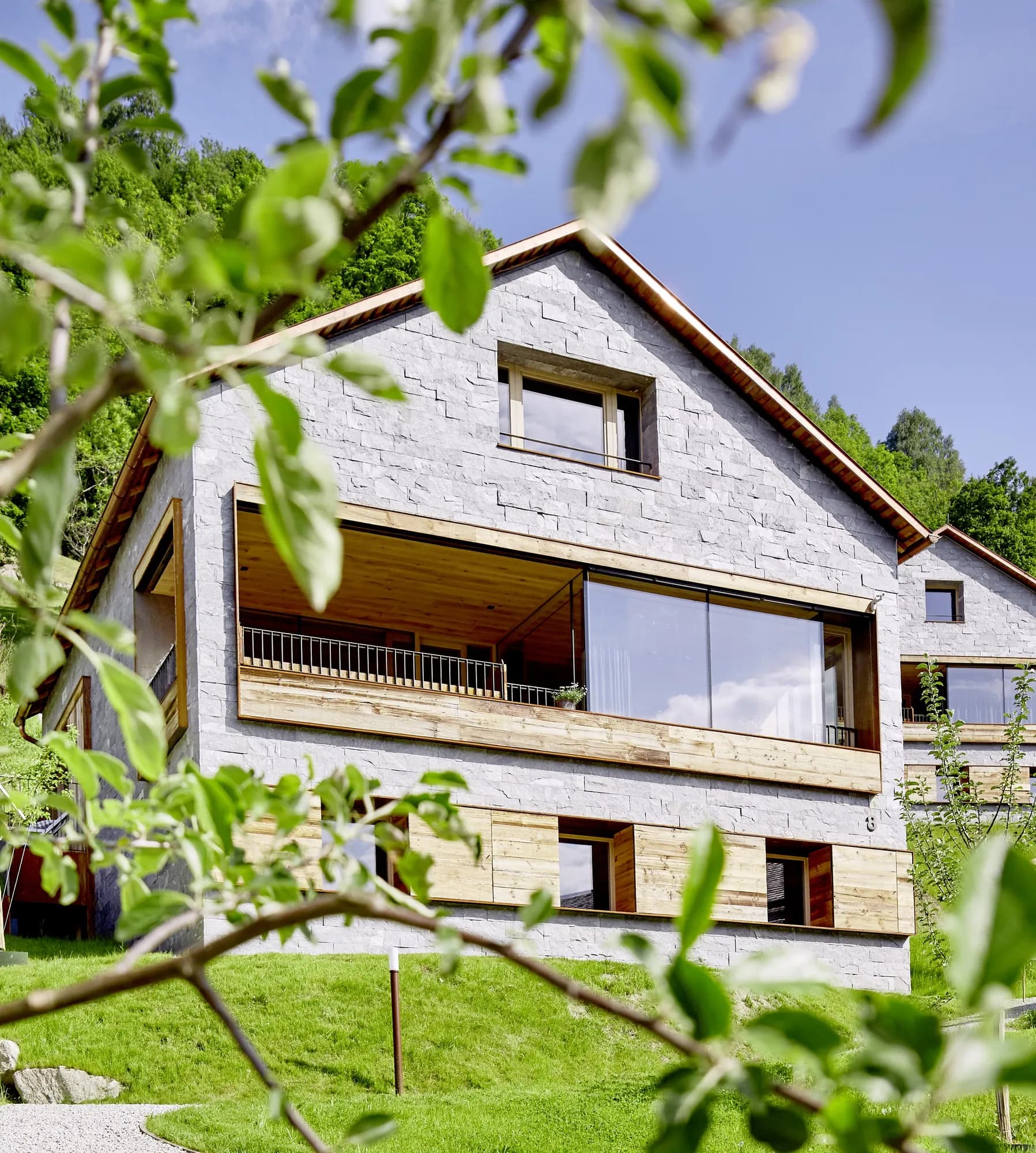 Modern exterior of Rafter Bramberg holiday rental with covered balcony and mountain view in Bramberg am Wildkogel